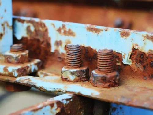 rusty screws due to chemical spill - deterioration of equipment