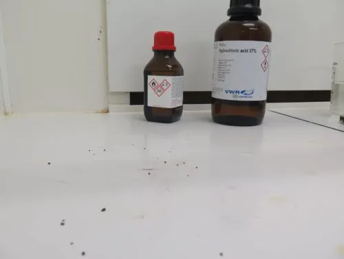 chemical spill of a corrosive acid on a surface - lab test, deterioration of equipment