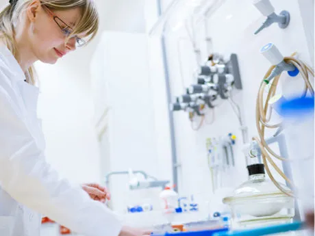 scientist who decontaminates laboratory equipment